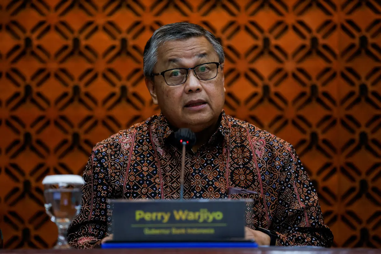 FILE PHOTO: Indonesia's Central Bank Governor Perry Warjiyo speaks during a press conference in Jakarta