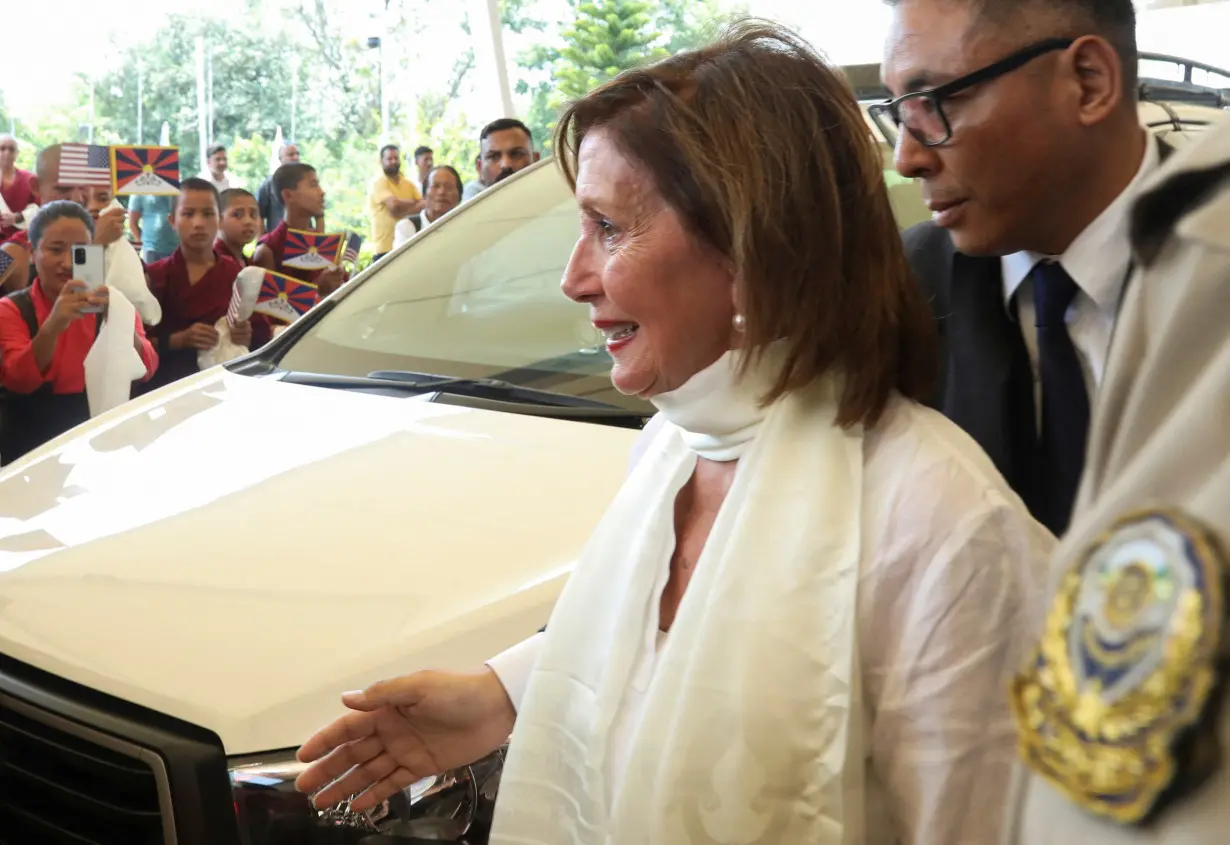 Former U.S. House speaker Nancy Pelosi is welcomed by the Tibetans upon her arrival in Kangra