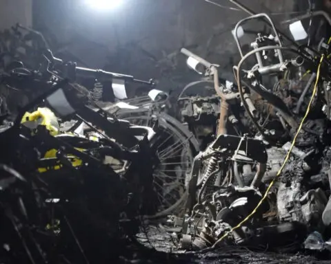 Witnesses say victims of a Hanoi high-rise fire jumped from upper stories to escape the blaze