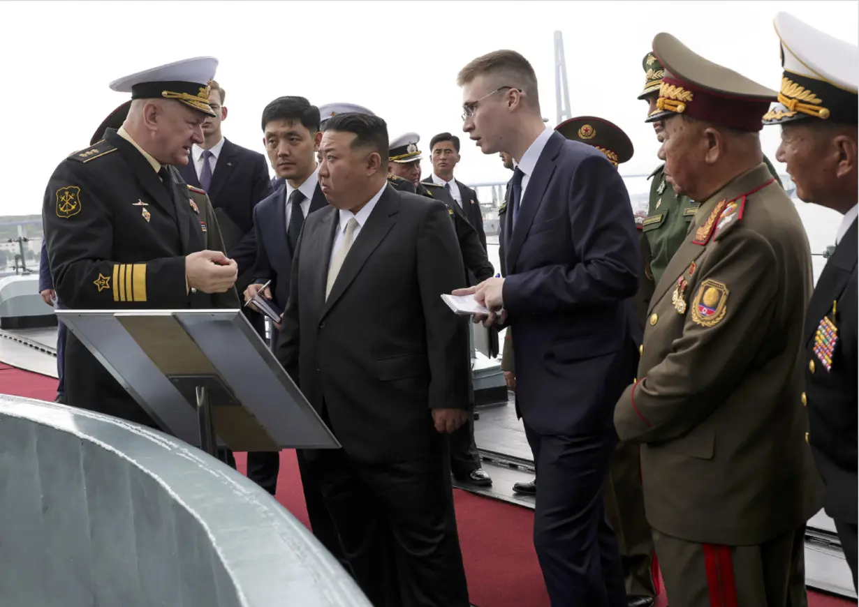 North Korea's Kim Jong Un inspects Russian bombers and a warship on a visit to Russia's Far East