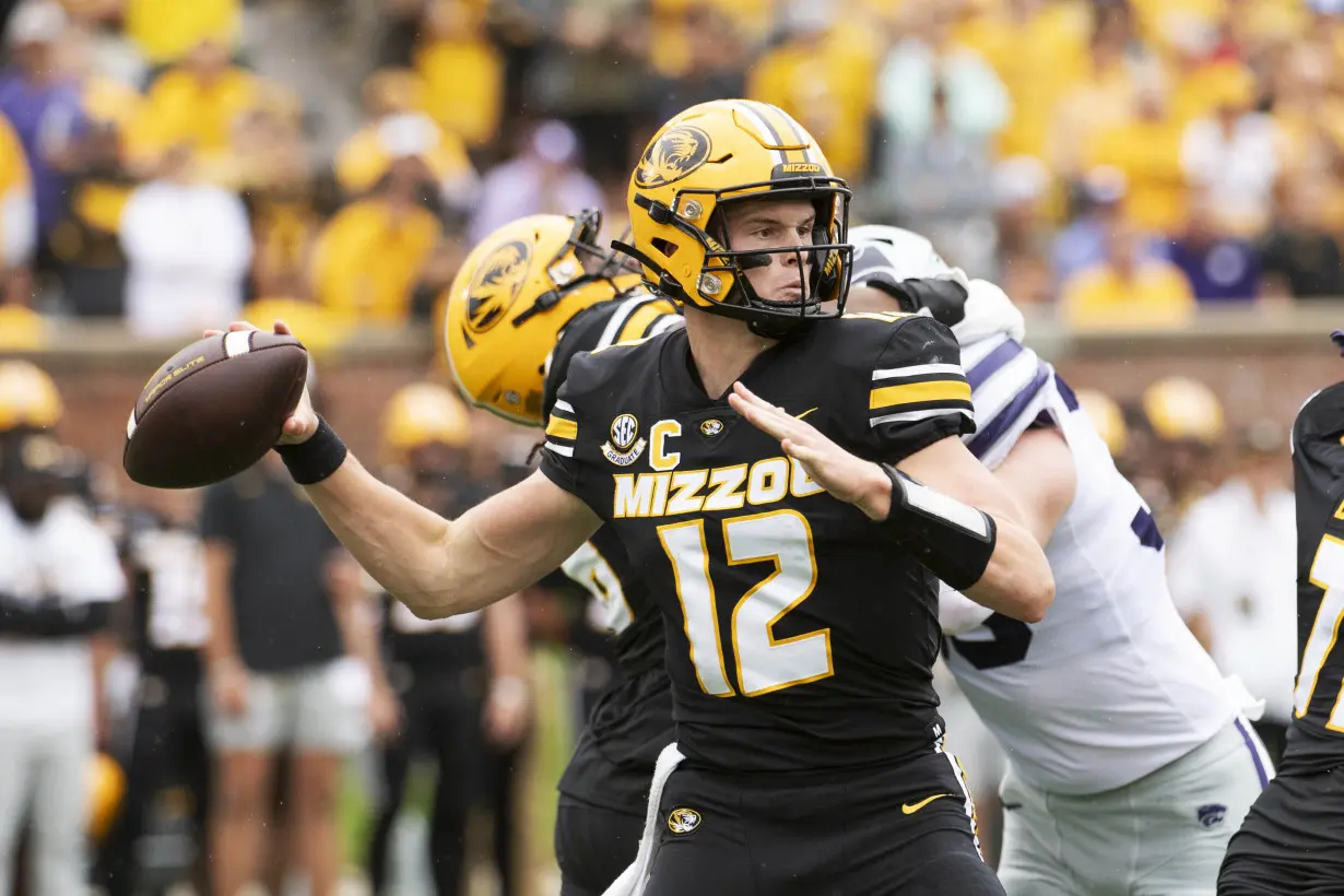 Missouri quarterback Brady Cook endures the home boos and keeps the Tigers on an unbeaten roll