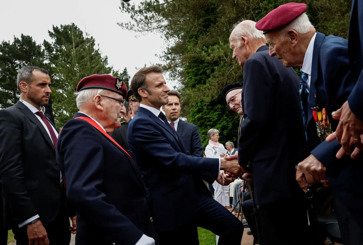 Macron pays tribute to civilian victims of D-Day bombings in Normandy