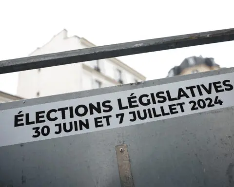 French political camps draw election battle lines on economy