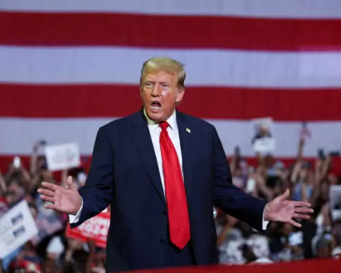 Judge partially lifts Trump hush money gag order