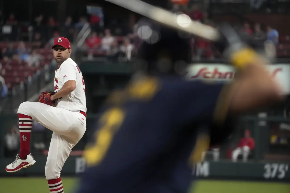 Wainwright gets 200th win as the Cardinals blank the Brewers 1-0