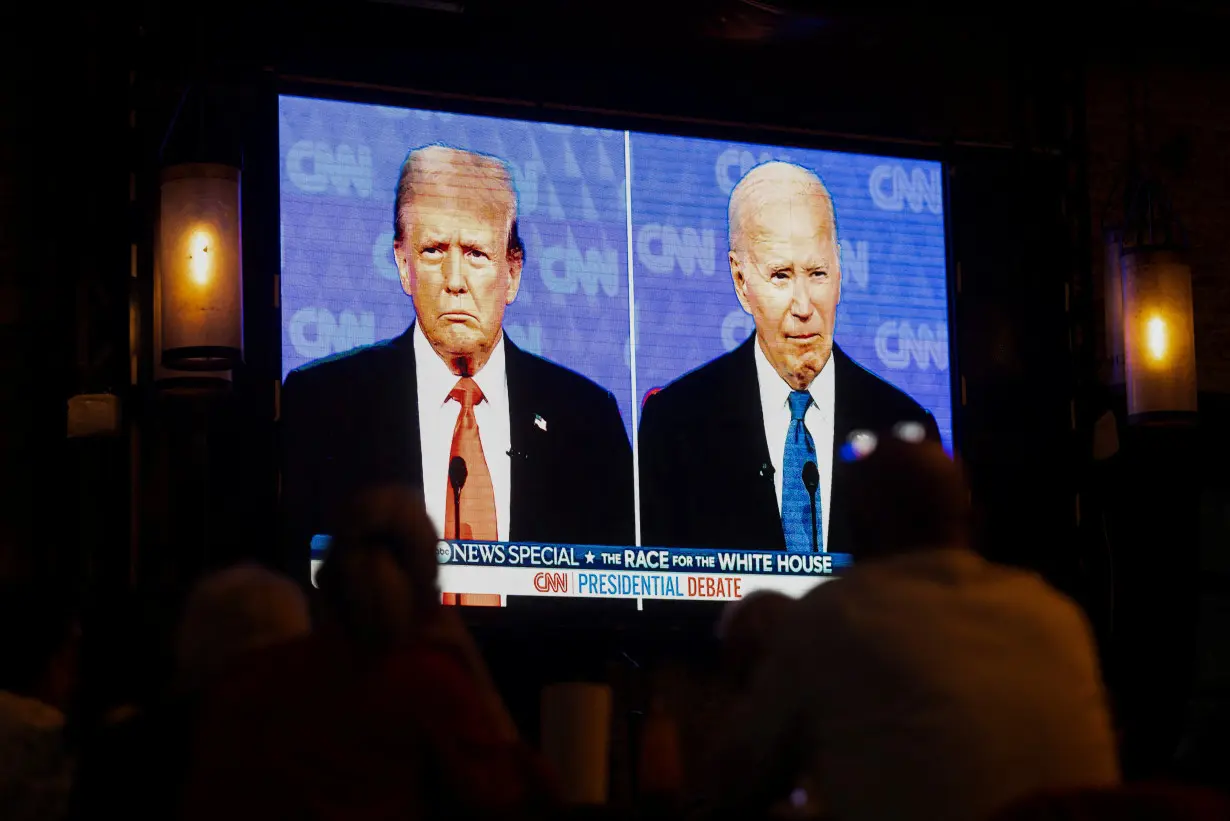 American citizens living in Mexico gather to watch the first debate between the two candidates for U.S. President, in Mexico City