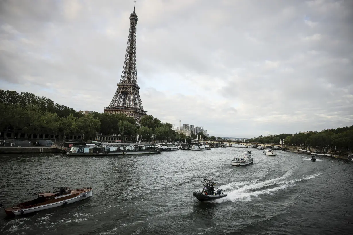 Paris gets into the groove for historic Olympic opening ceremony, adapted to its iconic cityscape