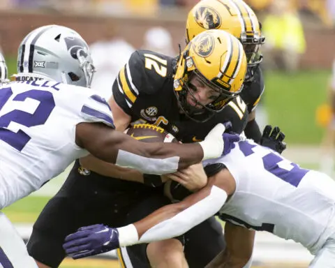Missouri quarterback Brady Cook endures the home boos and keeps the Tigers on an unbeaten roll