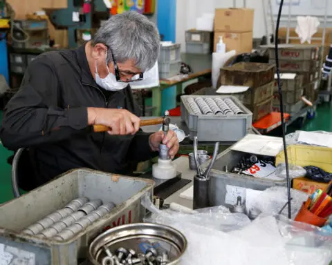 Japan's GDP downgrade, shaky business mood cloud BOJ hike timing