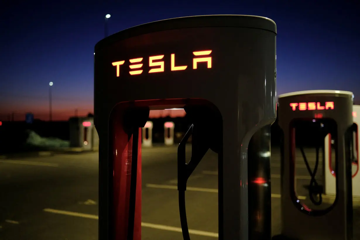 Tesla electric vehicle chargers are seen in Xinzo de Limia