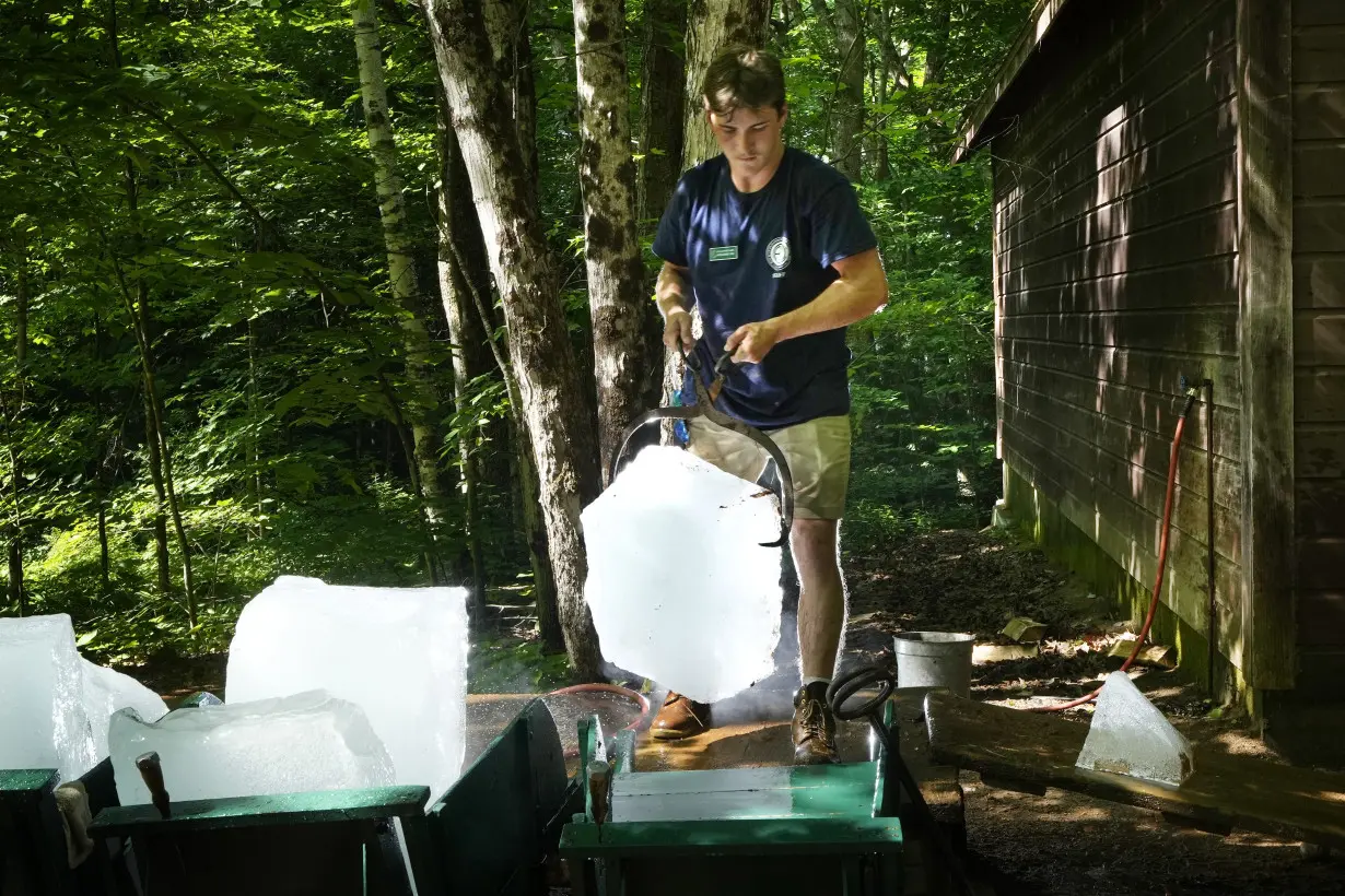 As millions sweat out the heat wave, blocks of lake ice keep these campers cool