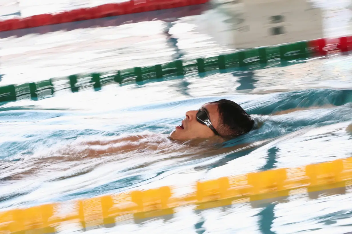 Palestinian Olympic swimmer hopeful, Yazan Al Bawwab, prepares for the 2024 Paris Olympics