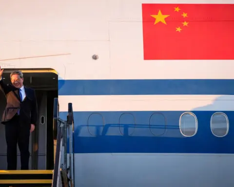 China's Premier Li arrives in Australia, says ties 'back on track'