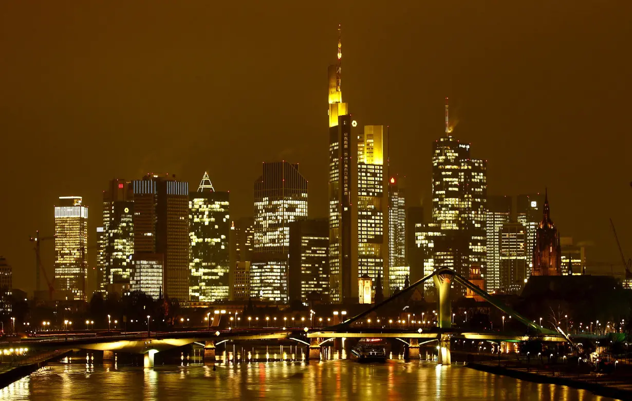 FILE PHOTO: The famous skyline with its banking district is pictured in early evening next to the Main River in Frankfurt, Germany