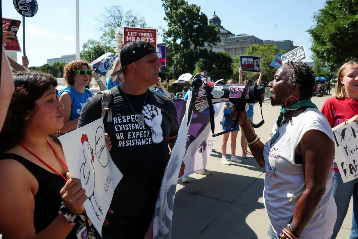 FILE PHOTO: Anti-abortion demonstrators rally outside the U.S. Supreme Court as justices issue orders in pending appeals in Washington