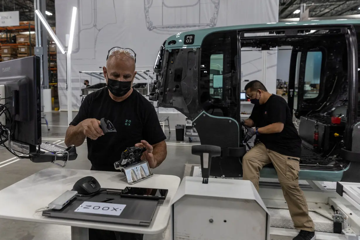 FILE PHOTO: Media tour at the assembly line factory of Zoox, a self-driving vehicle owned by Amazon, in Fremont