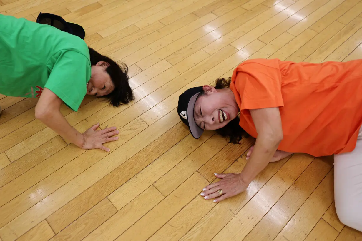 The Wider Image: Inspired by Olympics debut, Japan's seniors blaze breakdancing trail