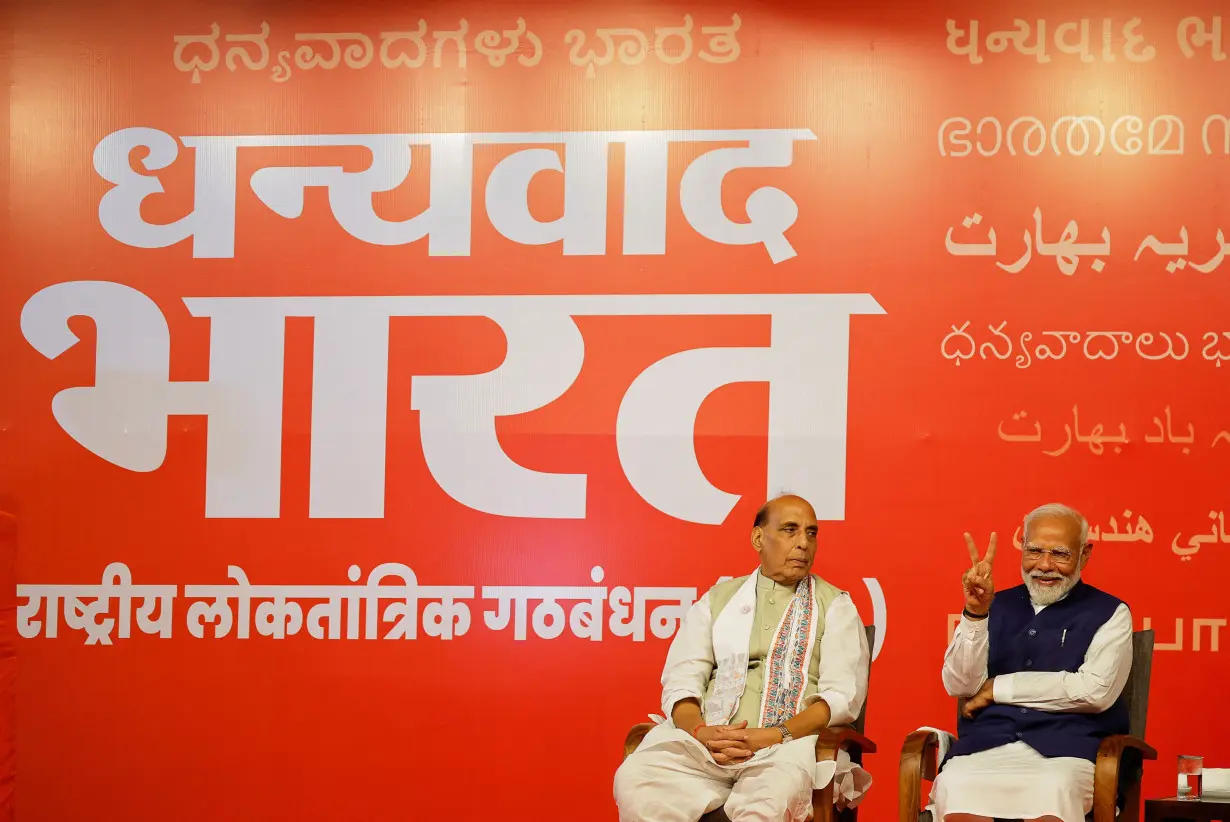 Indian PM Modi speaks to supporters at the BJP headquarters, in New Delhi