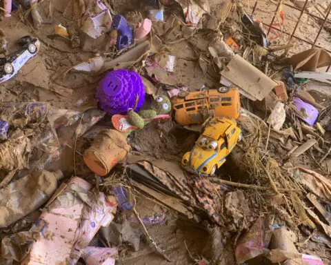 Searchers look for more than 10,000 missing in flooded Libyan city where death toll eclipsed 11,000