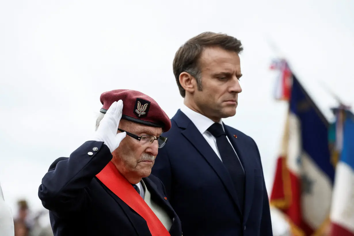 Macron pays tribute to civilian victims of D-Day bombings in Normandy