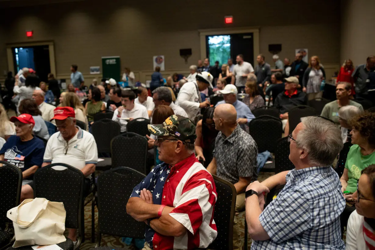 Voters gather to watch first presidential debate