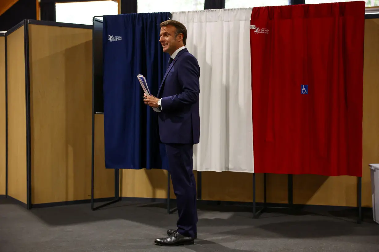 French President Macron votes during the European Parliament elections, in Le Touquet-Paris-Plage
