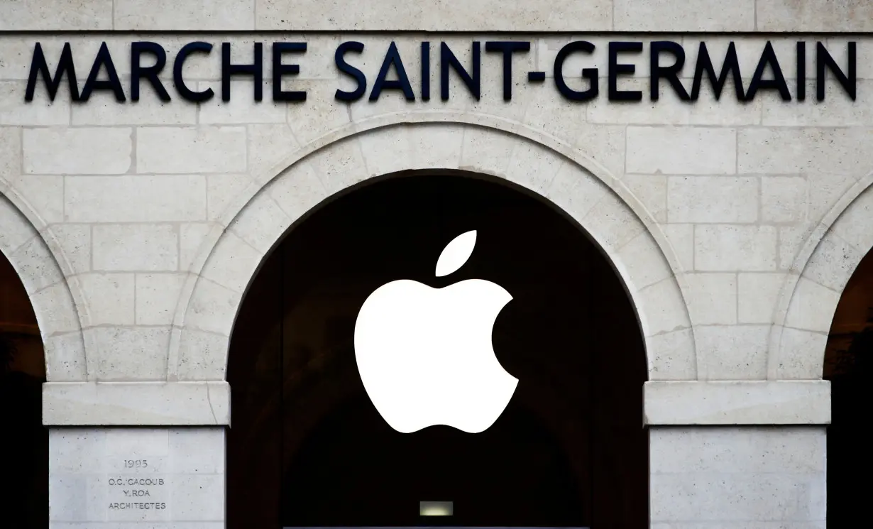 FILE PHOTO: Apple logo is seen on the Apple store at The Marche Saint Germain in Paris