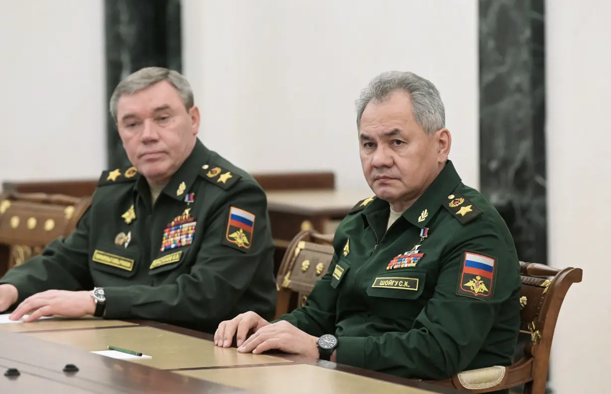 Russian President Vladimir Putin meets with Defence Minister Sergei Shoigu and Chief of the General Staff of Russian Armed Forces Valery Gerasimov in Moscow