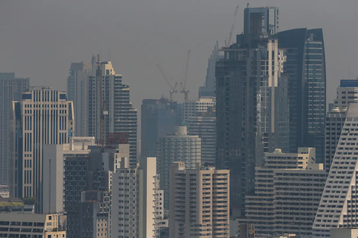 The skyline is seen through air pollution in Bangkok