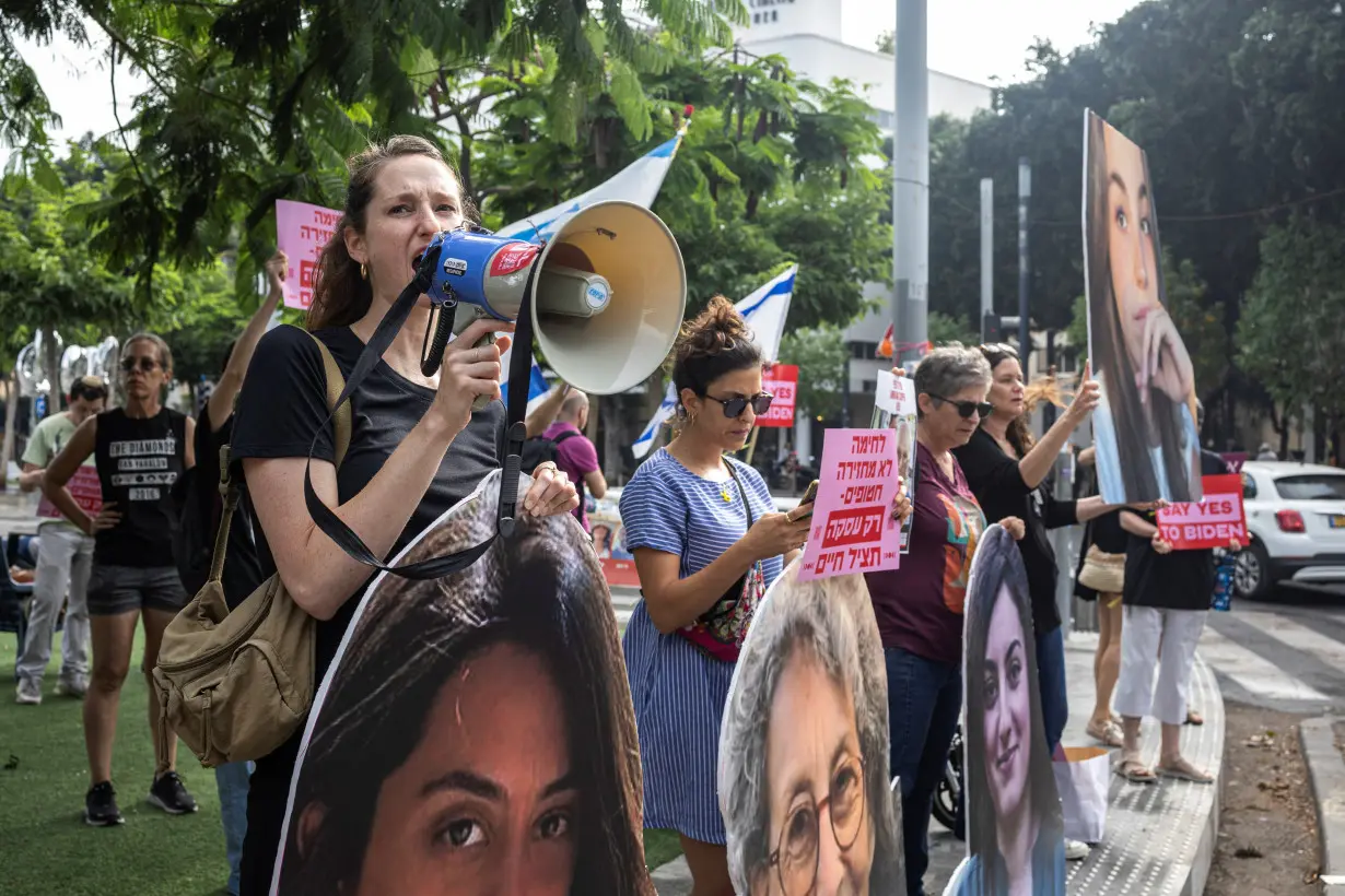 Supporters and families of hostages rally at Dizengoff square in Tel Aviv