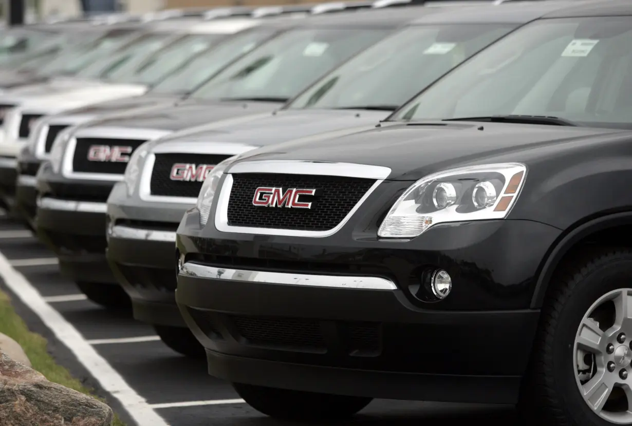 General Motors SUV's are displayed in an autosales lot in Troy