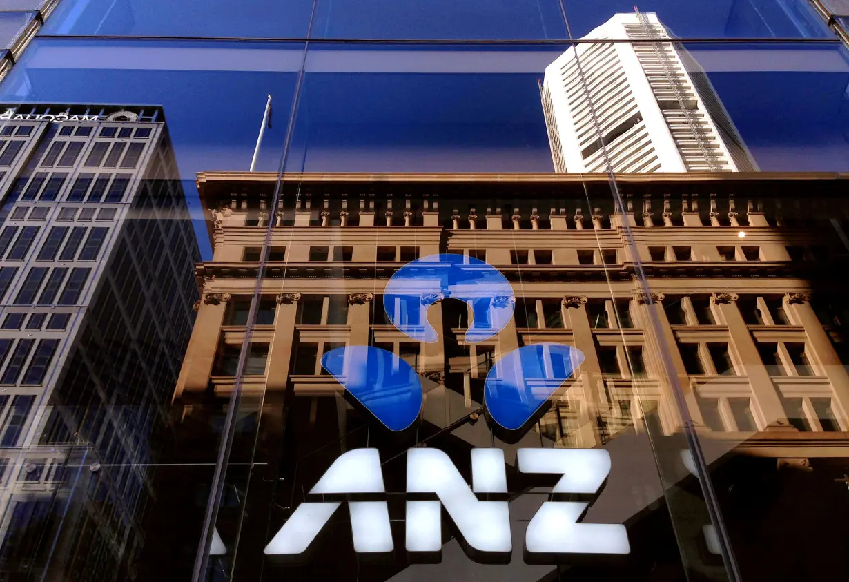 The logo of the ANZ Banking Group is displayed in the window of a newly opened branch in central Sydney