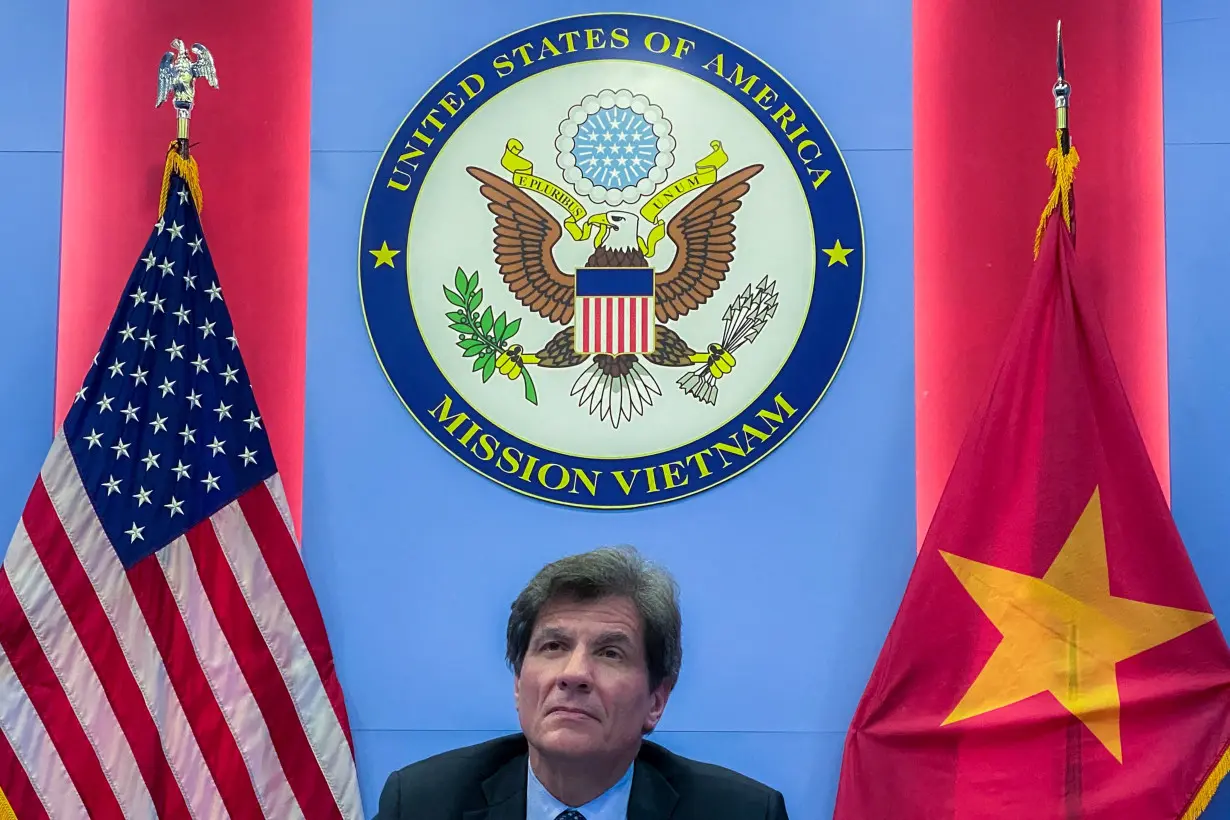 FILE PHOTO: U.S. Undersecretary for Economic Growth, Energy and the Environment Jose W. Fernandez looks on during a news conference in Hanoi