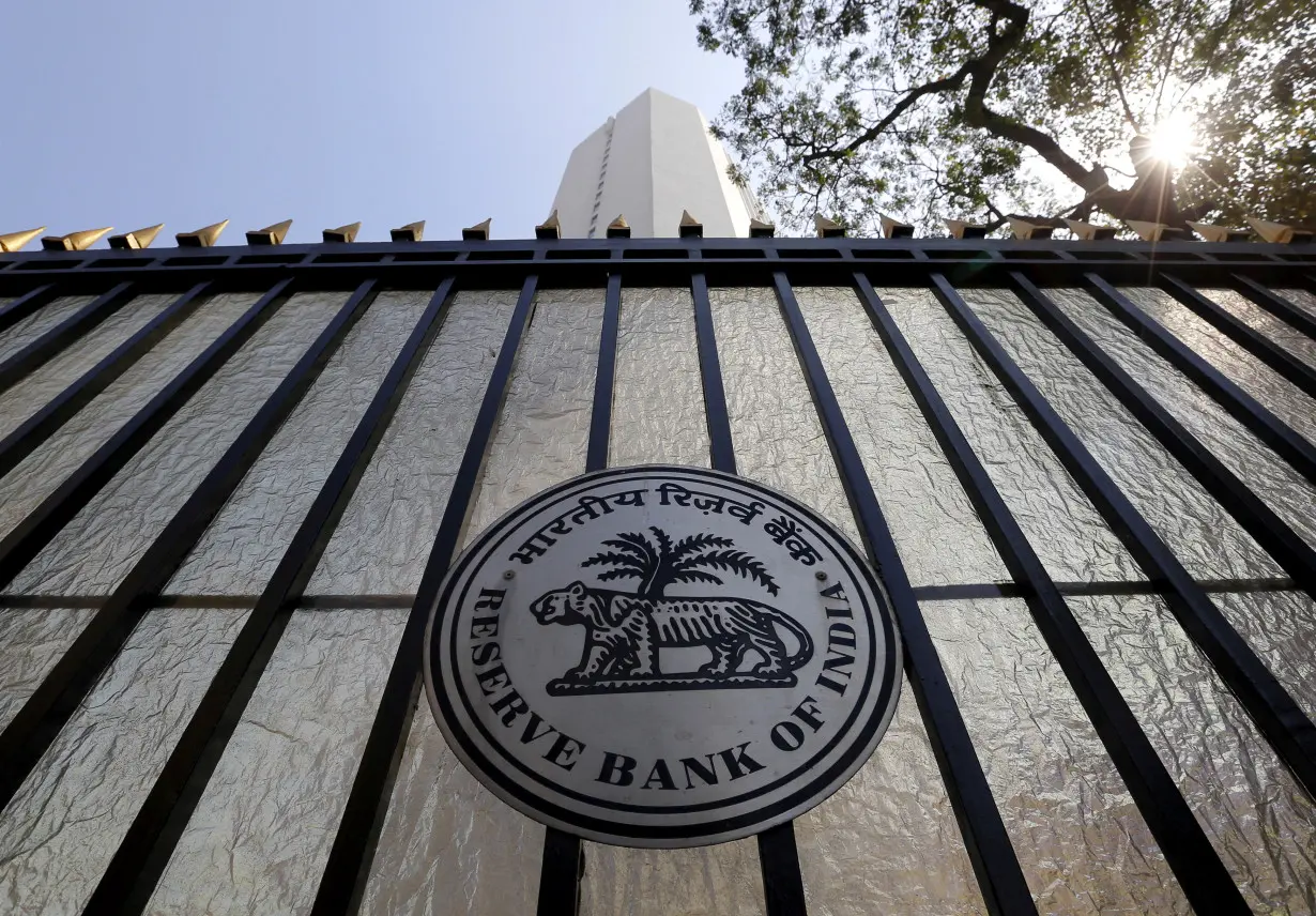 FILE PHOTO: The Reserve Bank of India (RBI) seal is pictured on a gate outside the RBI headquarters in Mumbai