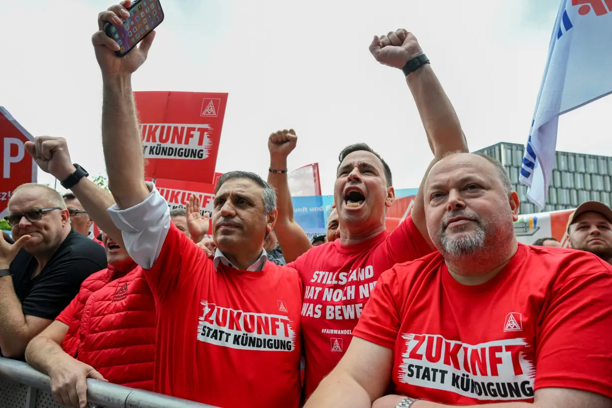 FILE PHOTO: Thyssenkrupp steelworkers rally at an IG Metall union protest in Essen