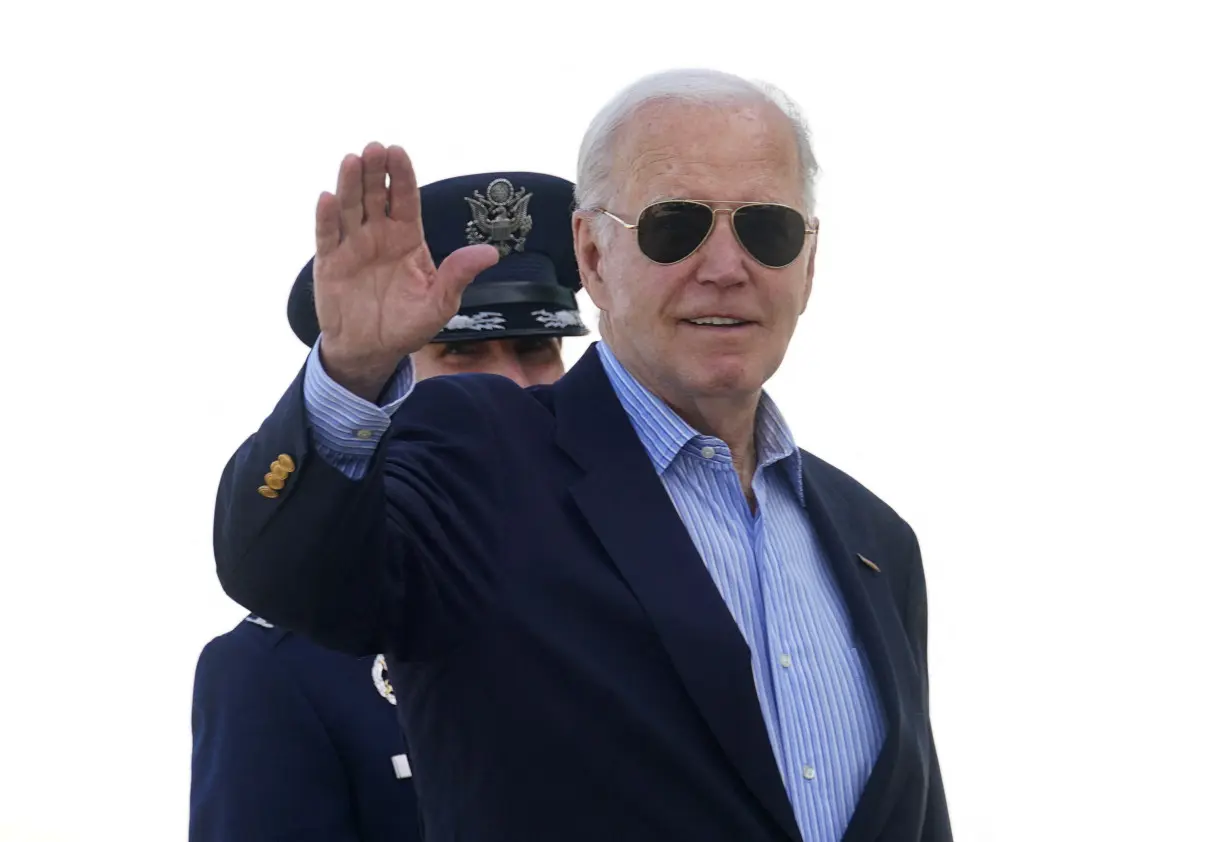 Biden boards Air Force One as he departs Washington for the G7 in Italy