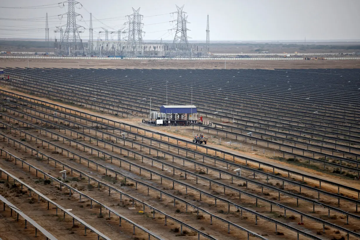FILE PHOTO: A general view of installed solar panels at the Khavda Renewable Energy Park of Adani Green Energy Ltd (AGEL), in Khavda