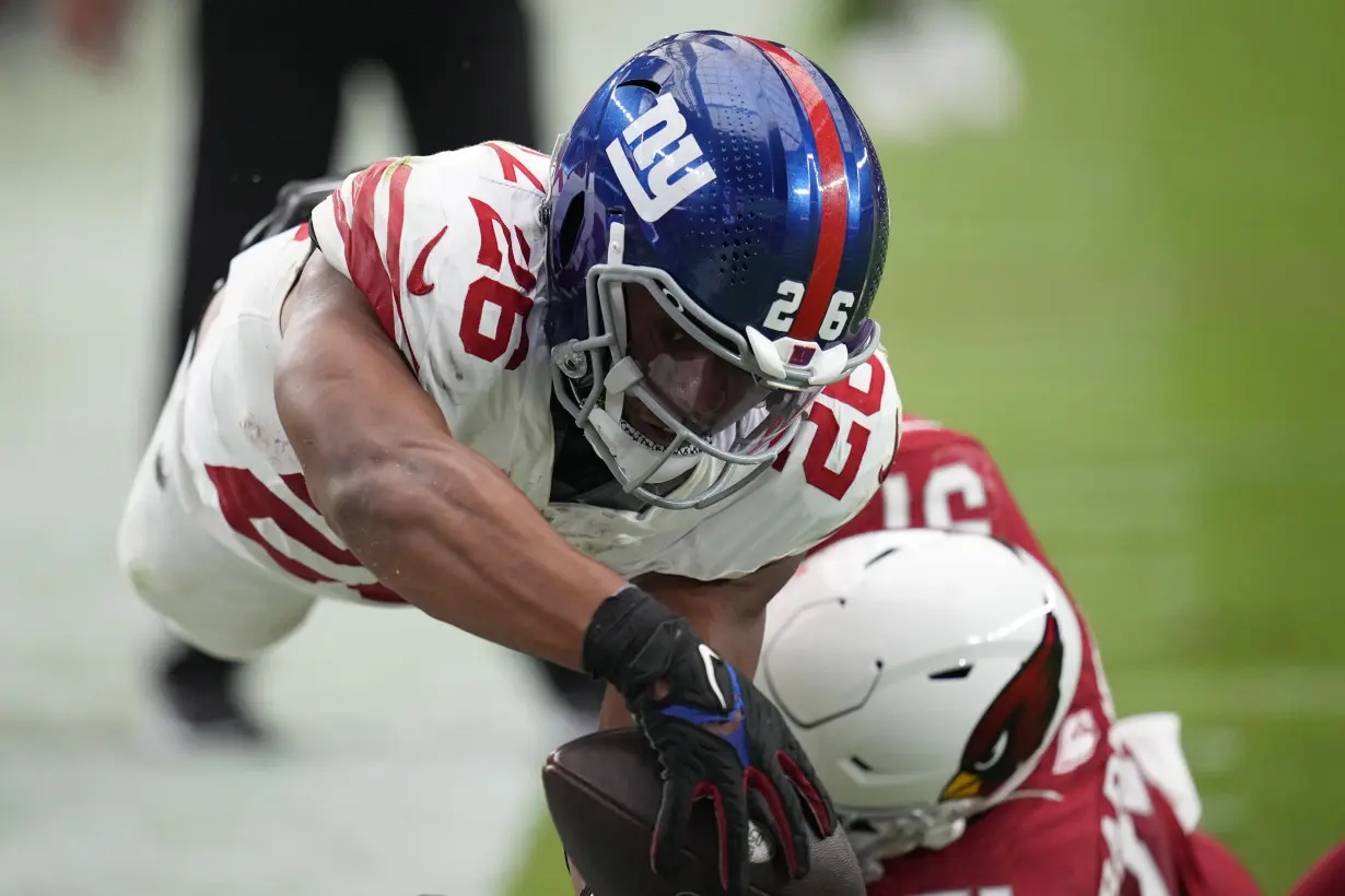 Giants running back Saquon Barkley has a sprained right ankle, AP source says