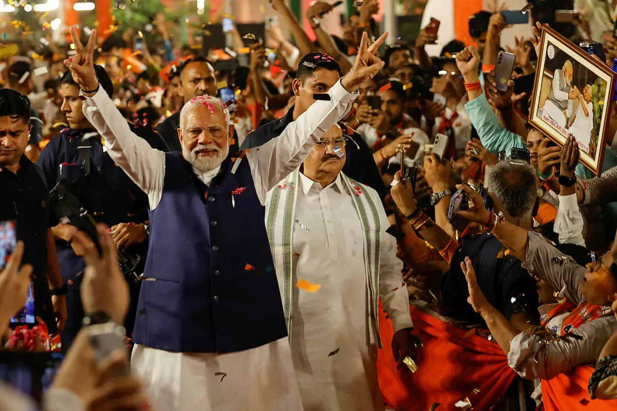 Indian PM Modi speaks to supporters at BJP headquarters, in New Delhi