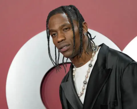 Rapper Travis Scott arrested after Miami Beach police say he drunkenly yelled at people on a yacht