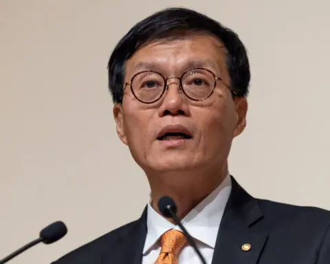 South Korea central bank chief says inflationary pressure easing