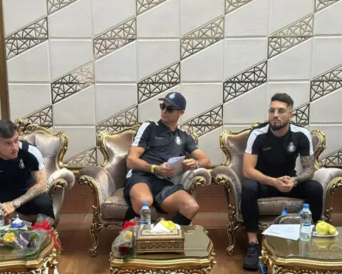 Iranian soccer fans flock to Cristiano Ronaldo's hotel after he arrives in Tehran with Saudi team
