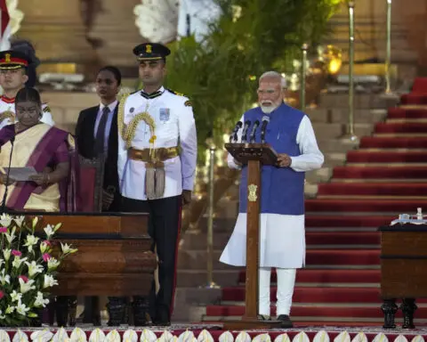 Relying on coalition partners, Modi is sworn in for a rare third term as India's prime minister