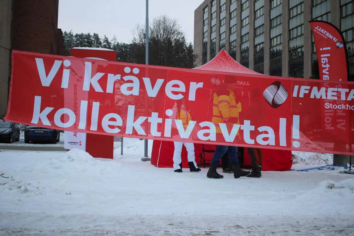 FILE PHOTO: Picket outside of a Tesla service centre in Upplands Vasby