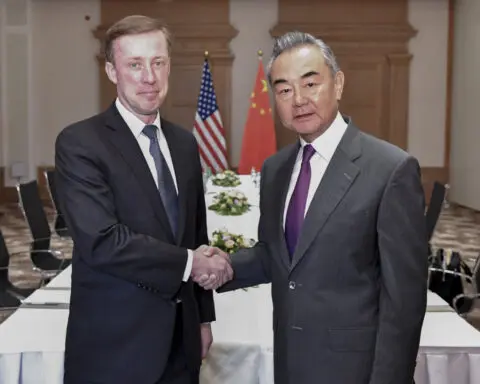 China's foreign minister holds talks in Russia after meeting with US national security adviser