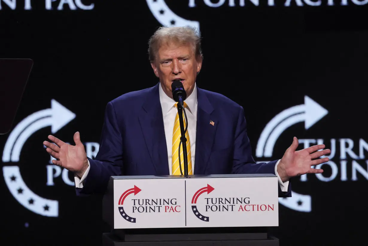 Former U.S. President Donald Trump attends a Turning Point USA event at the Dream City Church in Phoenix