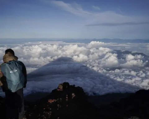 Rescuers seek to bring down bodies found on Japan's Mount Fuji