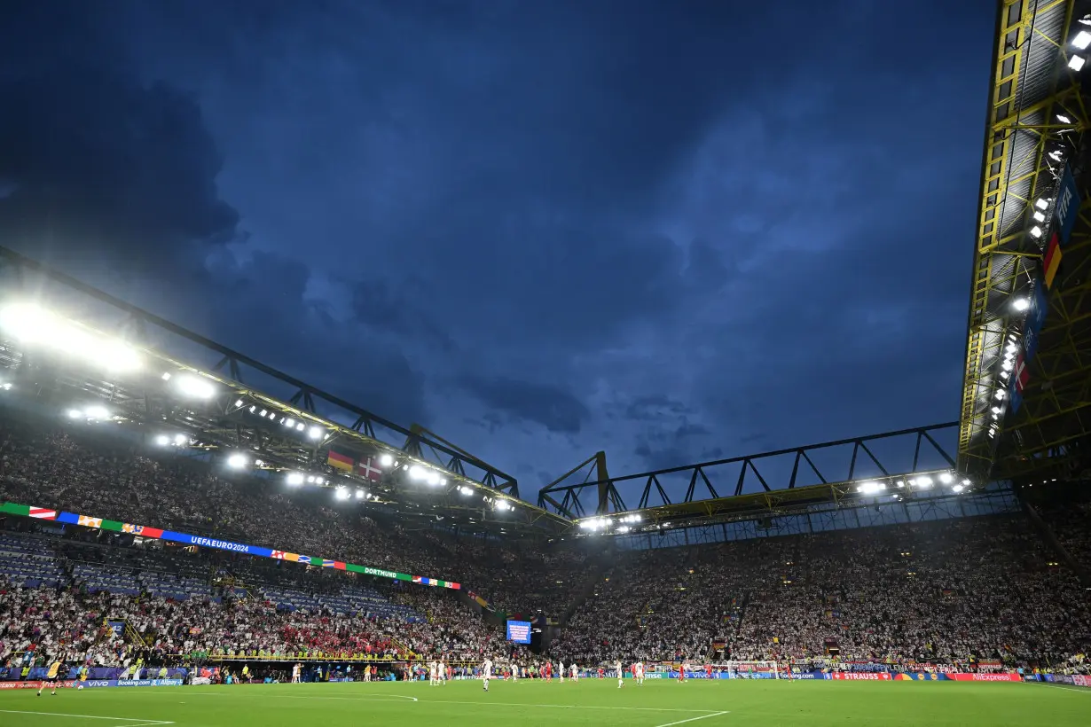 Man arrested after climbing onto roof of stadium during Euro 2024 game, police say he wanted to take ‘good photos’