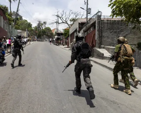 Haiti PM travels to US as Kenyan police patrol capital