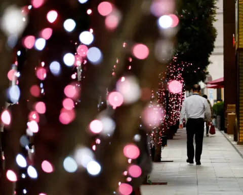 BOJ index shows more Japan firms passing on wage costs in services prices